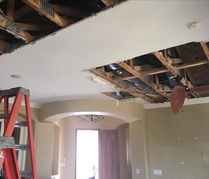 Ceiling damage from a water leak in a Phoenix, AZ home